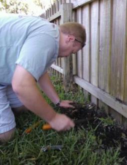 San Deigo sprinkler repair technician exhumes a troublesome pipe